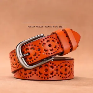 Cintura vintage in pelle arancione con motivo a fiori traforato e fibbia in metallo