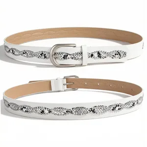 Detail of white women's belt with snakeskin pattern and matte silver D-ring buckle.