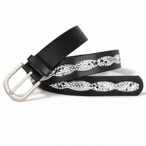Close-up of a black fashion belt featuring elegant wavy rhinestone decorations