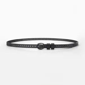Close-up of black thin leather belt with decorative perforations and metal pin buckle