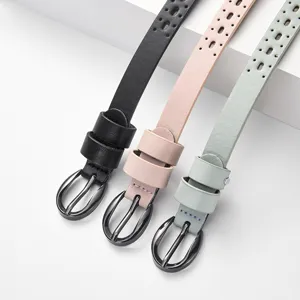 Detail view of slim women's belts with pin buckle and hollowed design in three colors