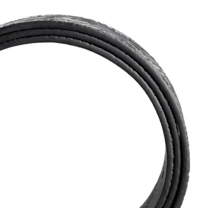 Detailed view of black embossed leather belt featuring intricate floral texture and edge stitching.