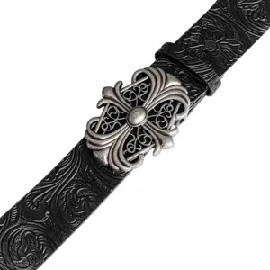 Black leather belt detail with floral embossed pattern and vintage silver hollow cross metal buckle.