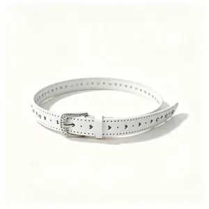Detailed close-up of white glossy women's belt with heart cutouts and rhinestone accents.