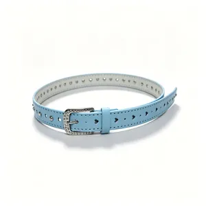 Detail view of a light blue leather belt with heart cutouts and rhinestone buckle.