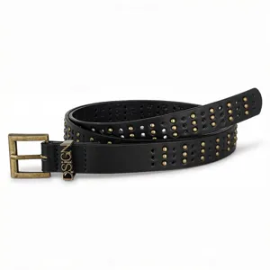 Detail view of punk style black rivet belt with D.SIGN letter buckle and studs