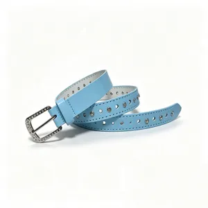Close-up of light blue glossy belt with rhinestone buckle and studded strap details