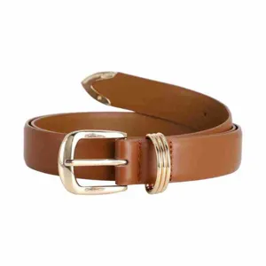 Close up detail of brown leather belt with gold metal buckle, triple rings and metal tip.