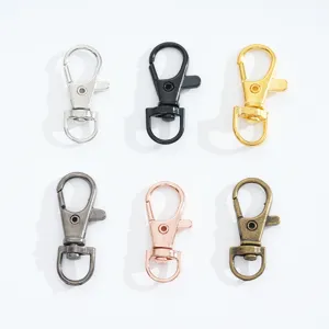 Six metallic alloy lobster claw clasps in various colors for bag and keychain hardware.