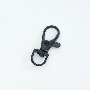 Macro view of a durable black metal swivel lobster clasp for bag hardware accessories