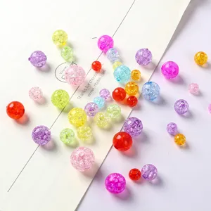 Close-up of colorful crackle glass beads, crystal clear texture, perfect for DIY jewelry.