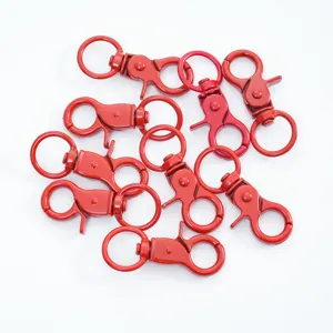Red baked paint swivel snap hooks and lobster clasps for DIY jewelry and keychains.