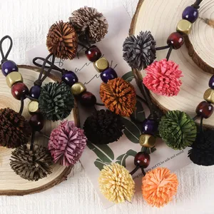 Vintage PU leather tassel pom pom bag charm with colorful wooden and metallic beads pendant.