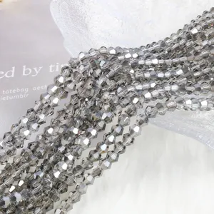 Macro view of 4mm grey AB faceted bicone glass crystal beads for DIY jewelry making
