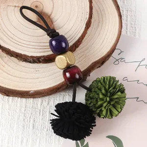 Vintage PU leather pom pom tassel bag charm with colorful wood beads pendant accessories.