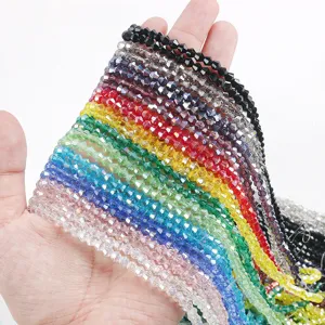 Close-up of various colorful 4mm AB bicone crystal glass beads for DIY jewelry making