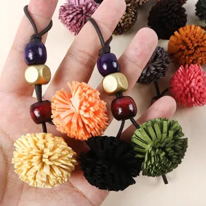 Vintage PU leather tassel pom-pom keychain with colorful wooden beads bag charm pendant.