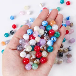 Close-up of colorful acrylic imitation cat-eye beads for DIY jewelry making