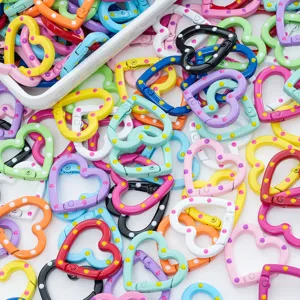 Colorful heart spring clips detail, metal lobster claw clasps for DIY jewelry making crafts.