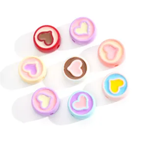 Colorful acrylic heart beads for DIY jewelry making, charm bracelets, and handmade craft accessories.