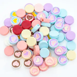 Colorful acrylic heart beads detail shot, perfect for DIY jewelry making, handmade bracelets.