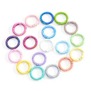 Colorful metal spring rings detailed view, perfect DIY jewelry accessories and keychain parts.