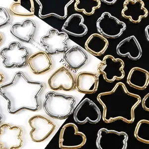 Collezione di moschettoni a molla in metallo a forma di stella, cuore e fiore