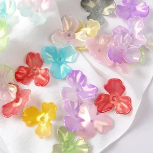 Detailed close-up of iridescent acrylic three-leaf flower petals for DIY jewelry accessories.