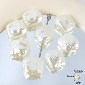 Close-up detail of irregular square baroque pearl beads showing texture and size specs.