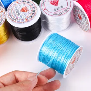 Detail view of a blue elastic crystal string spool for DIY jewelry making and beading