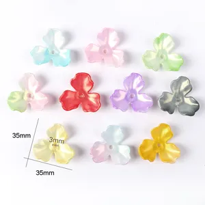 Detailed view of 35mm acrylic AB phantom magnolia flower petals for jewelry DIY.