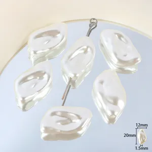 Close-up of irregular baroque pearl acrylic beads, smooth finish, perfect for DIY jewelry making.