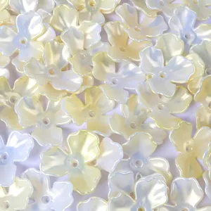 Close-up of pearlescent AB iridescent acrylic magnolia flower petal beads