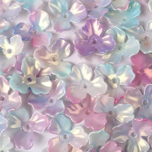 Macro view showing the pearlescent iridescent finish of trifoliate magnolia flower beads