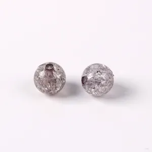 Detail shot of crackle glass beads, ice cracked loose beads for DIY jewelry making accessories.