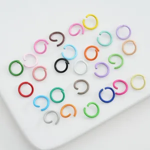 Macro view of various colorful painted alloy open jump rings for DIY jewelry making