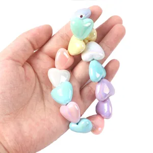 Colorful acrylic AB heart loose beads close up detail, perfect for DIY jewelry making and crafting.