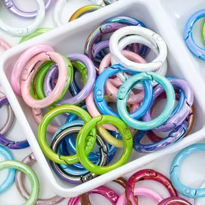 Colorful metal spring rings detail shot, ideal for DIY jewelry making and keychains.
