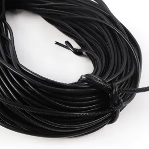 Close-up of 3mm black PU leather cord with stitched detail for DIY crafts and bag decoration