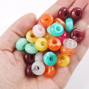 Detailed shot of 14mm colorful acrylic large hole round bread loose beads for DIY crafts.