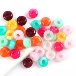 Close-up shot of colorful 14mm acrylic donut beads, perfect for diy jewelry and phone chains.