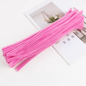 Close-up of bright pink pipe cleaners for DIY crafts and handmade floral bouquet accessories.