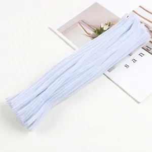 Close-up view of light blue fuzzy pipe cleaners for DIY craft handmade projects and accessories.