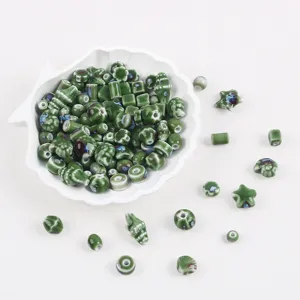 Handmade mixed green ceramic kiln-changed beads in various shapes for DIY jewelry making