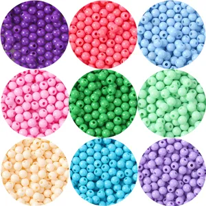Détail de perles rondes en acrylique colorées de 3/4mm pour bijoux faits main