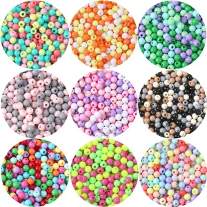 Vue détaillée de perles rondes en acrylique colorées 3 mm pour la création de bijoux DIY