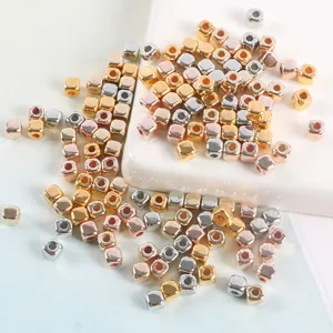 Detailed view of metallic square CCB spacer beads, shiny electroplated finish for DIY jewelry.