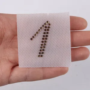 Motivo de pedrería número 1 termoadhesivo cristal brillante para decoración de ropa y accesorios.
