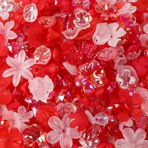 Mixed red and pink acrylic flower and petal beads with frosted and AB iridescent finish.