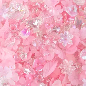 Detailed close-up showing pink frosted AB acrylic flower and leaf beads for DIY jewelry